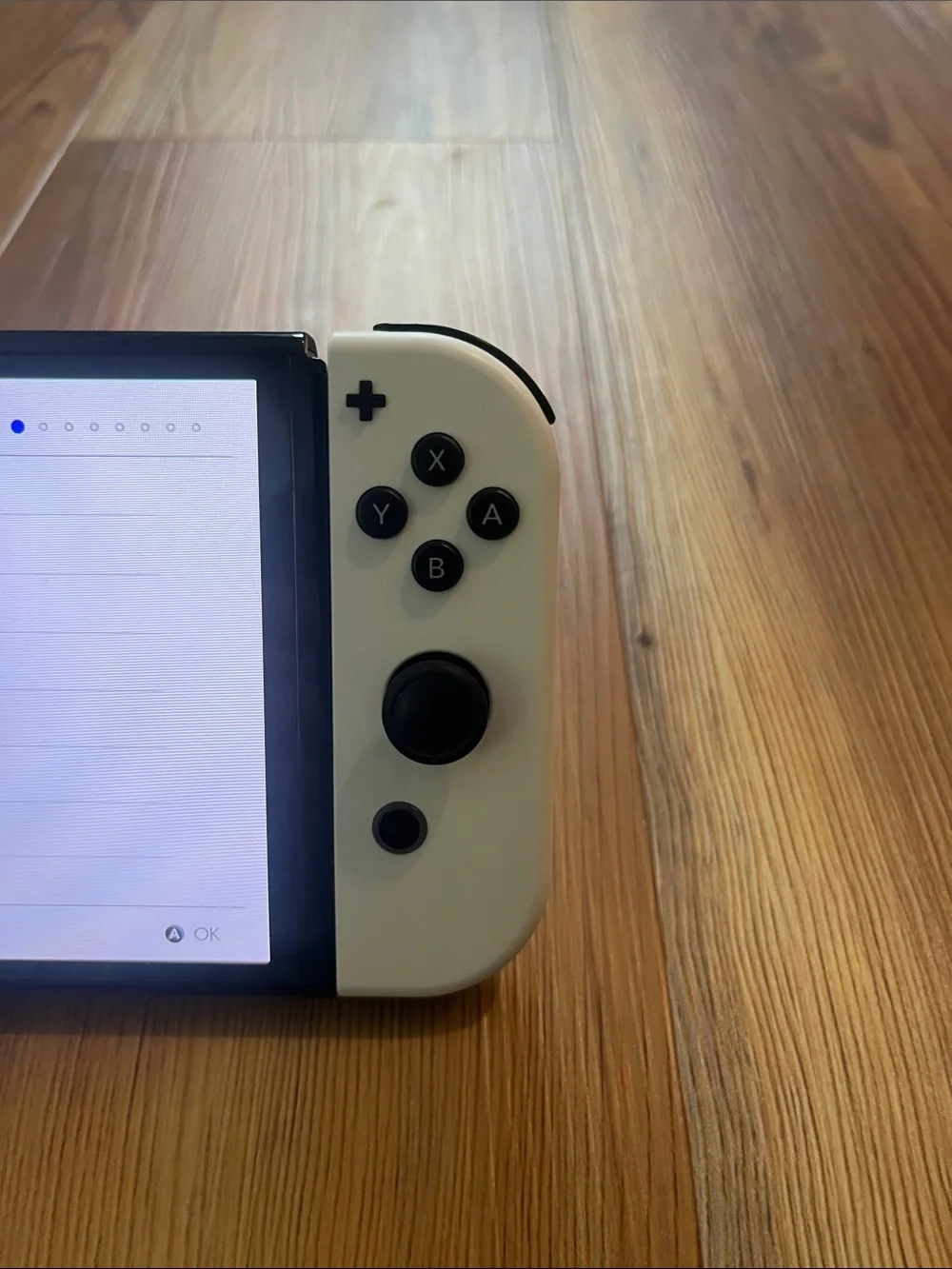 Nintendo Switch OLED Console with White Joy-Con Controllers Bundle